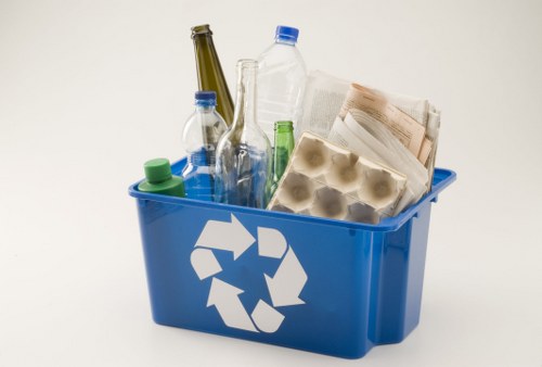 Business professionals organizing office space for clearance